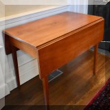 F07. Cherry double drop leaf table. 29”h x 36”w x 20”d 